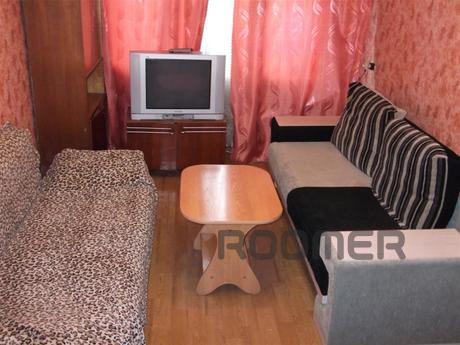 Furniture and other amenities: a double bed, sofa, coffee ta