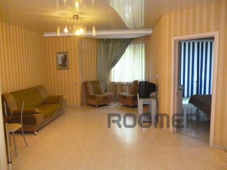 A comfortable one-bedroom studio apartment in a luxury house