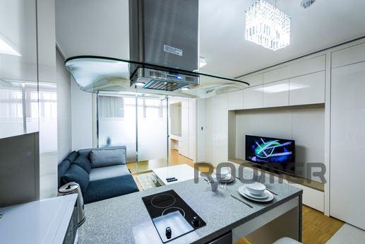Compact studio with a separate bedroom, located on the 27th 