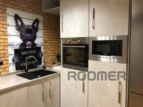 Loft studio with fireplace, new building, Kyiv - apartment by the day