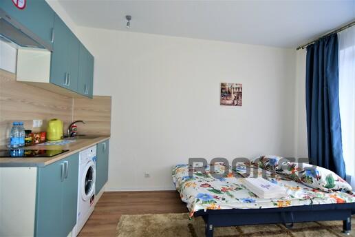 New cozy studio with designer renovation in a new house in t