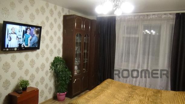 This cozy apartment is located near the train stations and t