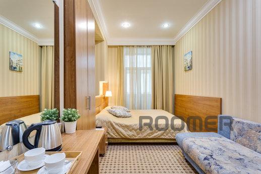 A cozy room in a mini-hotel on Tverskaya for two people. A s