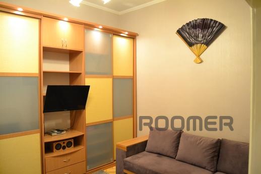 The apartment is located in the very center of Kiev (entranc
