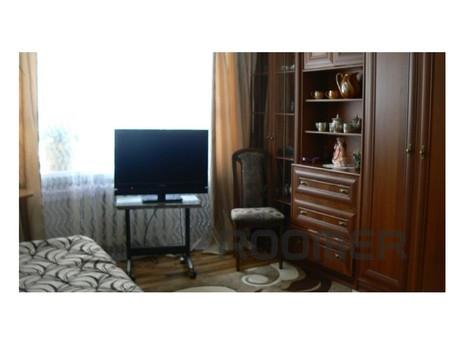 The apartment is located in the city center, on the first fl