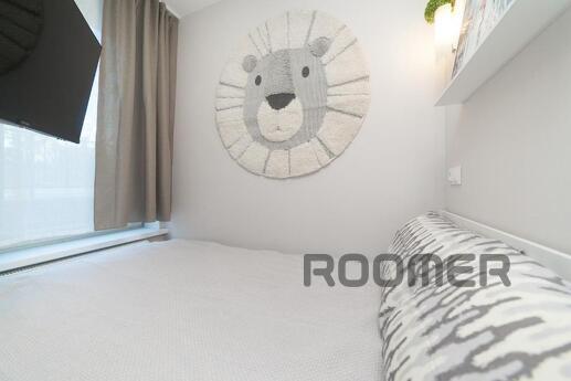 The apartment is located in the business-class residential c