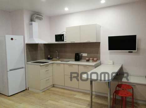 One-room studio apartment is located on the 7th floor of a 9