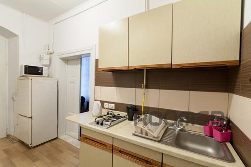 A large three-room apartment in the city center near the Ope