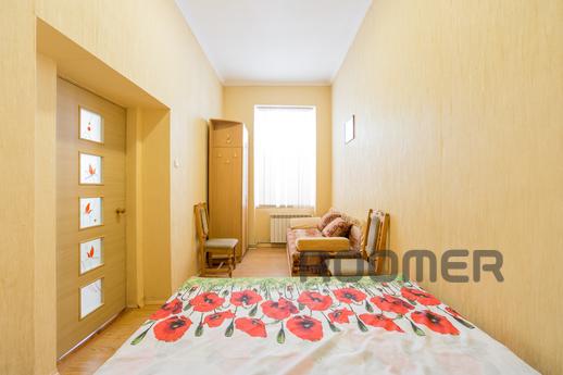 The apartment is located in historic downtown street Taman, 
