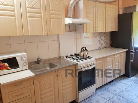 One bedroom apartment in the city center, Yuzhny - apartment by the day