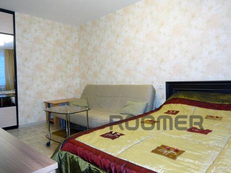 The apartment is located in the central part of the city. Ne