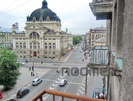 apartment in the city center overlooking the Opera House. In