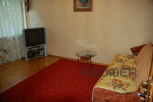 Brick house with iron door intercom to the apartment co-oper