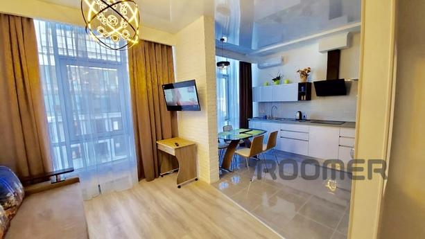 Apartment in a new guarded house with the latest renovation,