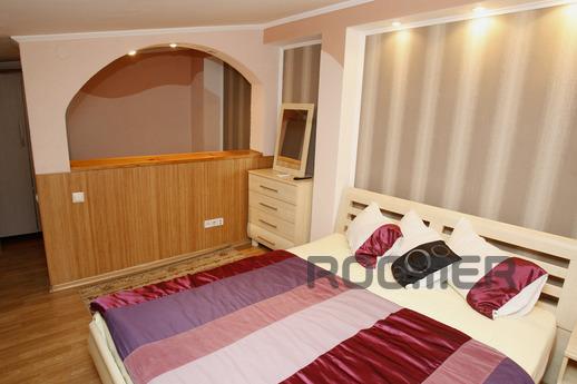 Studio apartment of the original layout is two-level in the 