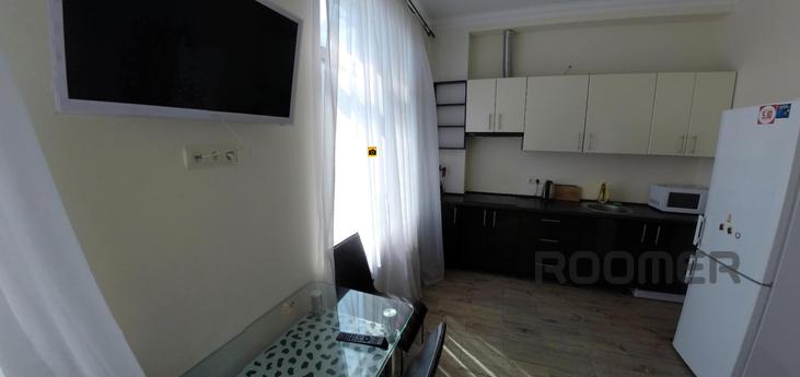It offers a comfortable apartment in a prestigious new build