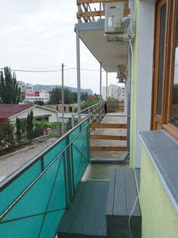 A two-story cottage 15 min from the sea, Sudak - apartment by the day