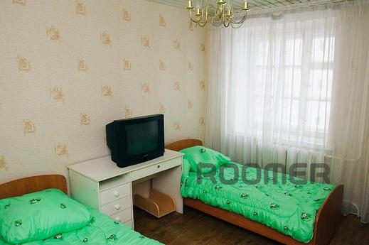 room in a 4-room apartment with a key. each room has two sin