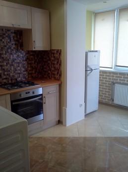 Rent an apartment in a new building on T, Odessa - apartment by the day