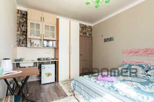 Bright studio overlooking Alatau, Almaty - apartment by the day