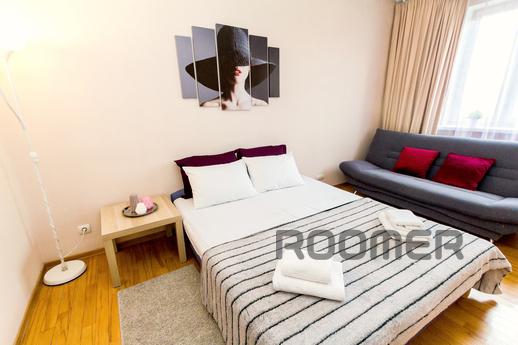 In a 7-storey building on an individual project with a fence